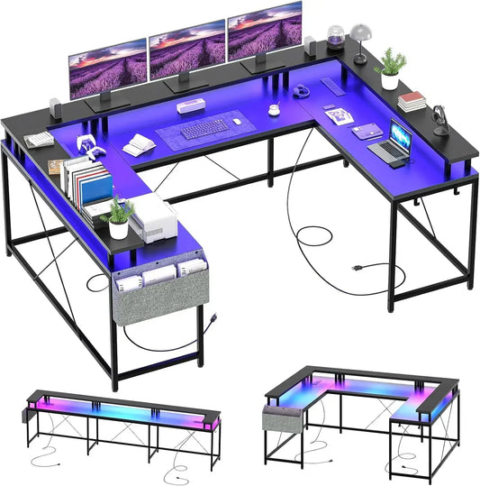 Black U-shaped gaming desk with blue LED lights, monitor stands, side storage, and accessories.