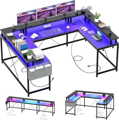 A U-shaped black gaming desk with blue LED lighting, three monitors, a laptop, and organizer shelves.