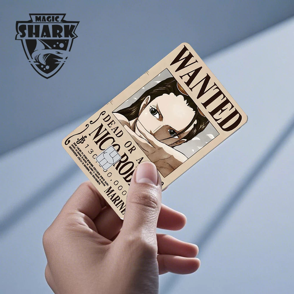 Tan anime card skin with "WANTED" and "NICO ROBIN" text, held in a hand.
