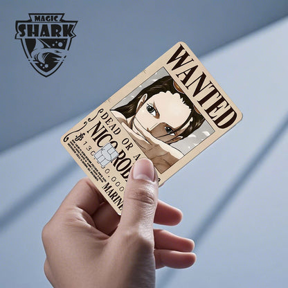 Tan anime card skin with "WANTED" and "NICO ROBIN" text, held in a hand.