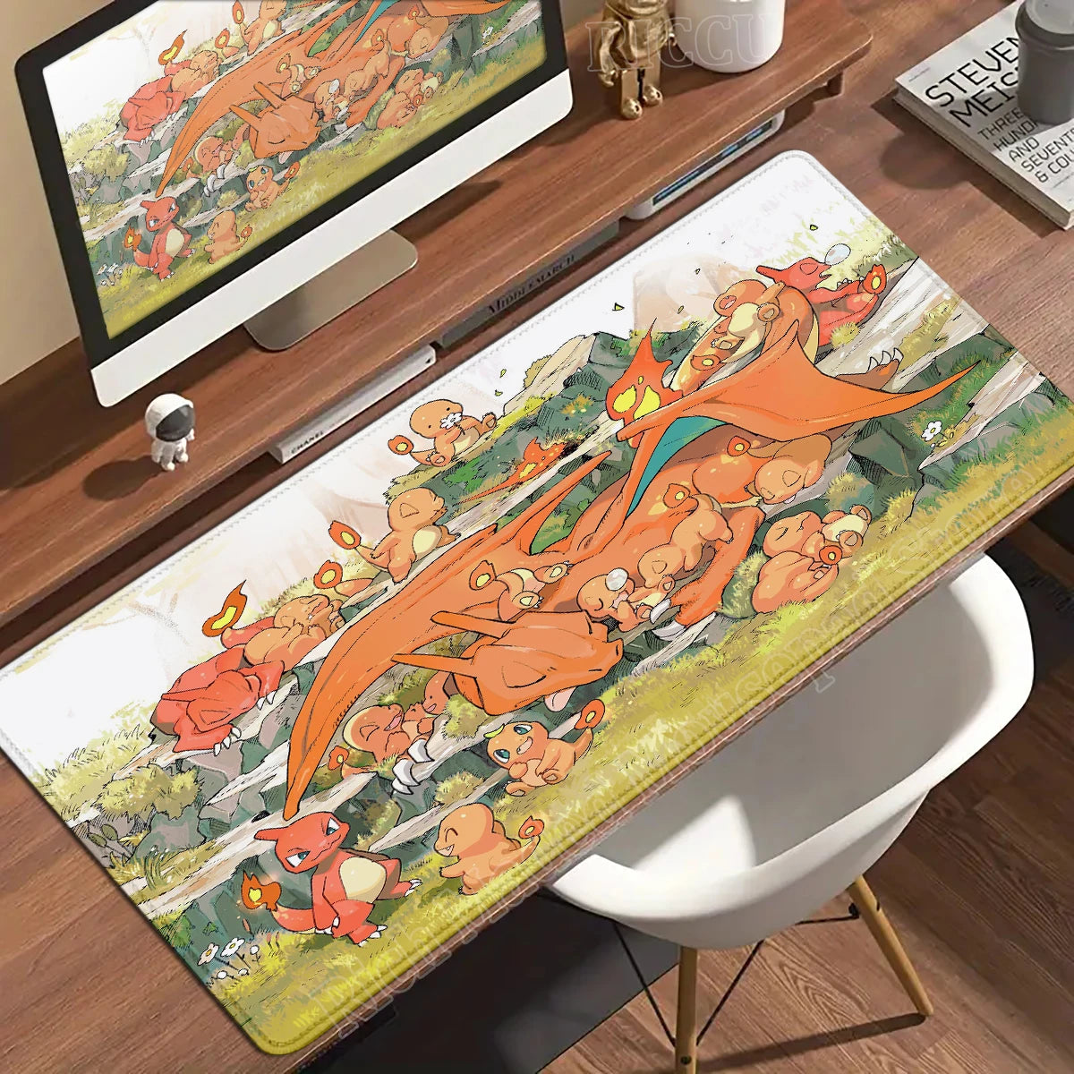 Anime desk mat with orange Charizard and Charmander characters resting in a grassy landscape.