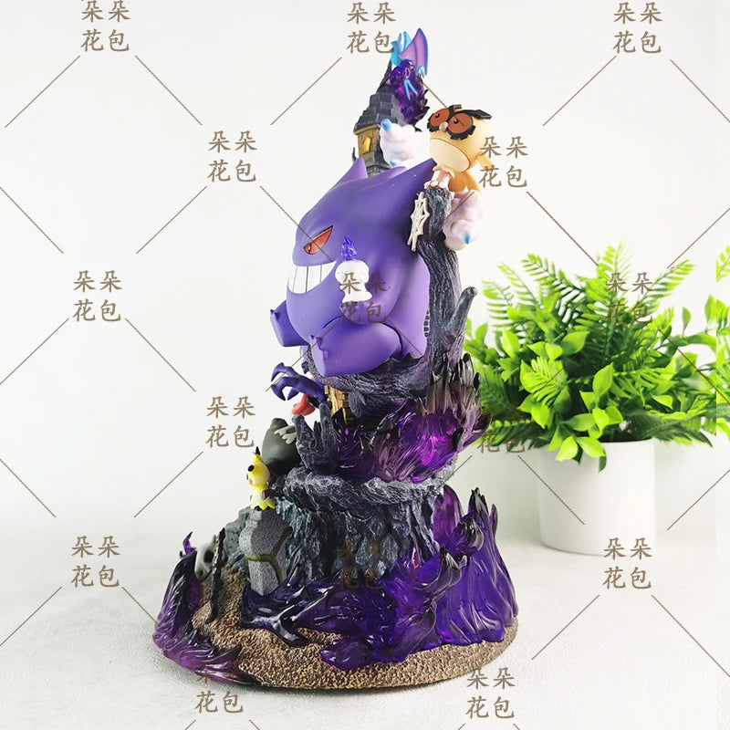 Gengar and other Pokémon in purple flame diorama ornament with a potted plant nearby.