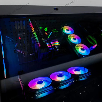 Black computer chassis integrated table with glowing RGB cooling fans and internal hardware components.