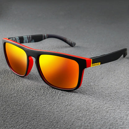 Square sunglasses with black and red frames and reflective orange-yellow lenses.