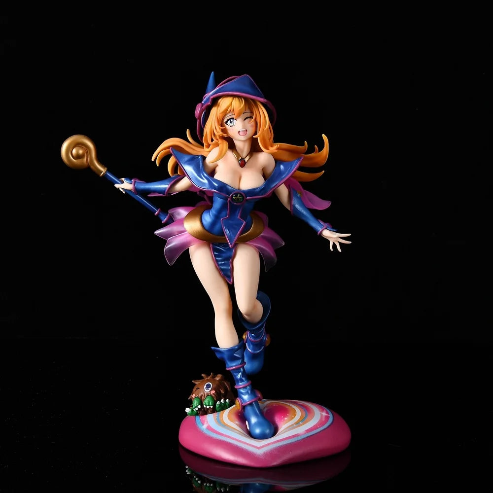 Dark Magician Girl anime figure in blue outfit holding a staff, standing on a colorful base.