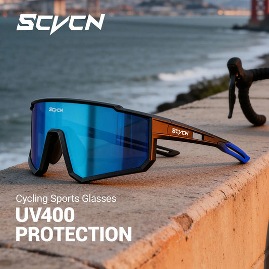 SCVCN cycling sunglasses with black frames and reflective blue lenses resting on a concrete ledge by the sea.