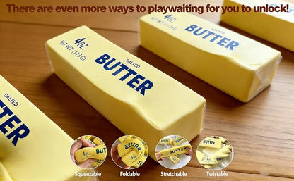 Yellow butter stick stress toys with blue "Salted Butter" text on a wooden table, featuring squeeze demos.