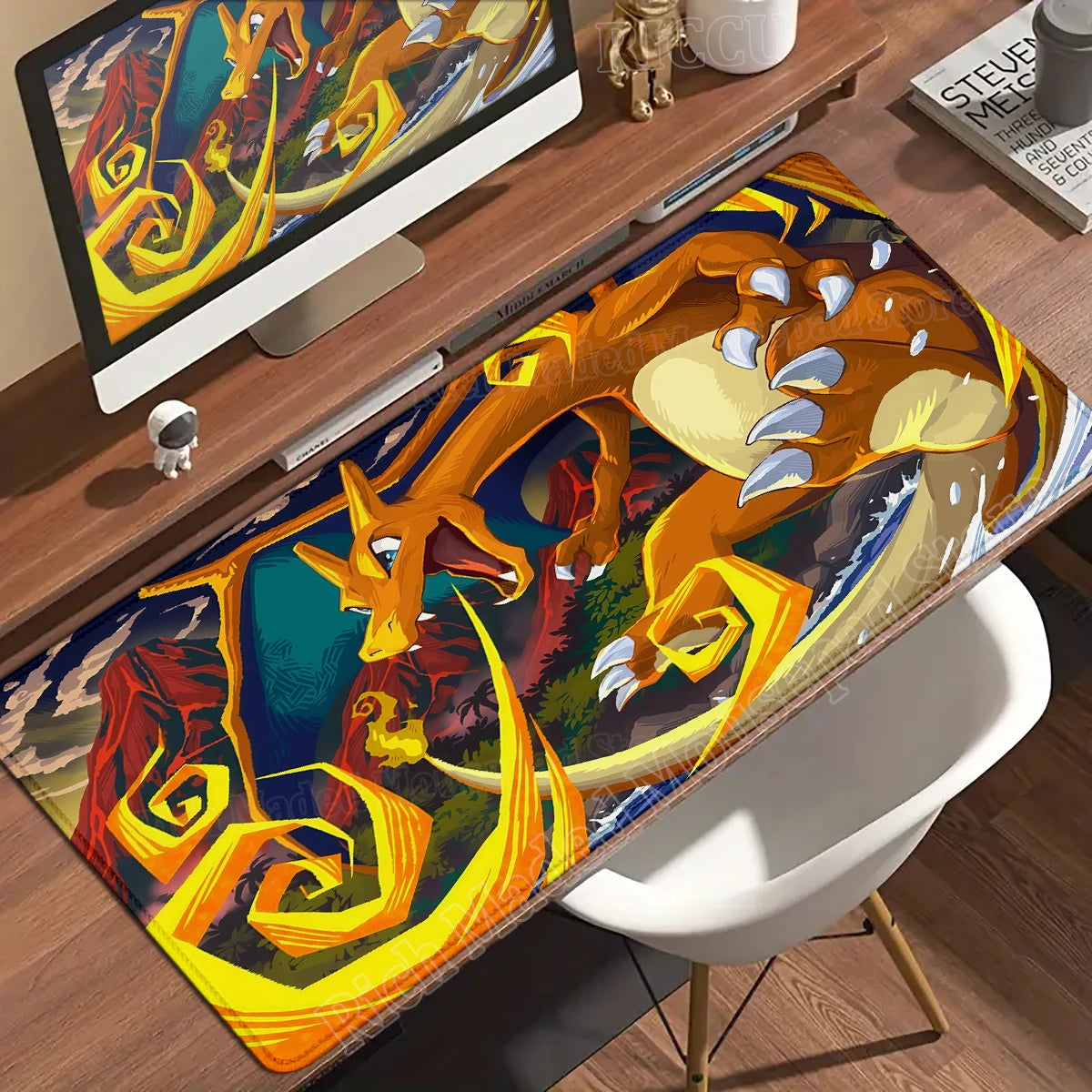 Charizard desk mat features an orange dragon-like creature with yellow flames against a dark, rocky landscape.