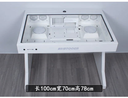 A white computer desk with a glass top exposing an internal PC case layout, featuring dual circular fan mounts.
