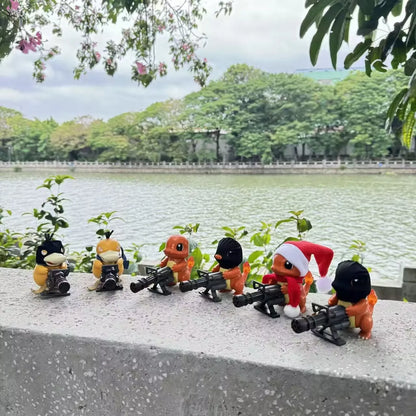 Six small Pokémon figurines in ski masks and a Santa hat, holding Gatling guns outdoors.