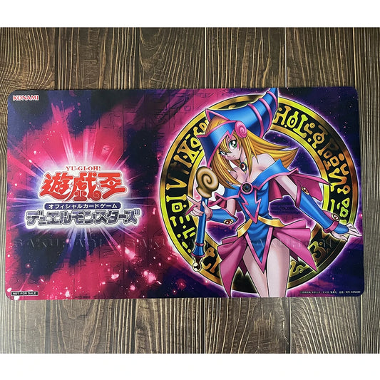 Dark Magician Girl playmat in pink and blue, featuring the Yu-Gi-Oh! logo on a dark, mystical background.