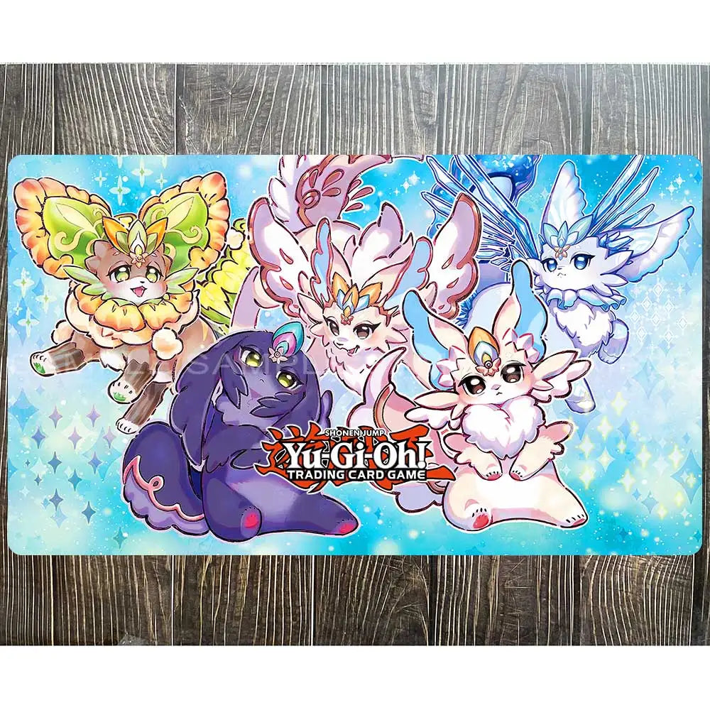 Yu-Gi-Oh playmat with five stylized fantasy creatures in yellow, purple, white, and blue against a light blue, sparkly background.