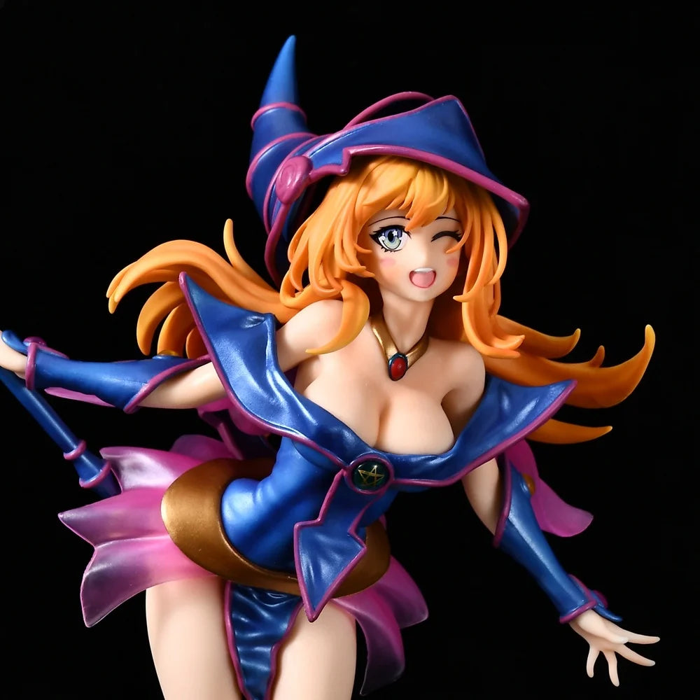 Dark Magician Girl figurine in blue and pink outfit with winking expression and orange hair.