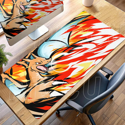 A large desk mat featuring Charizard breathing red, orange, and white flames on a wooden desk.