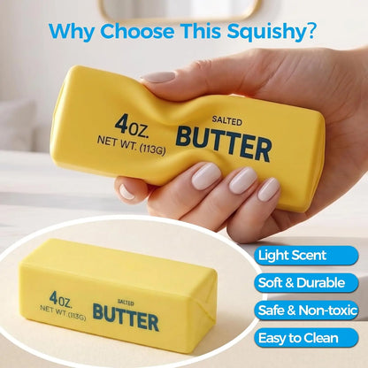 Hand squeezes a yellow stick of butter labeled "4oz. NET WT.(113G) SALTED BUTTER," indenting it.