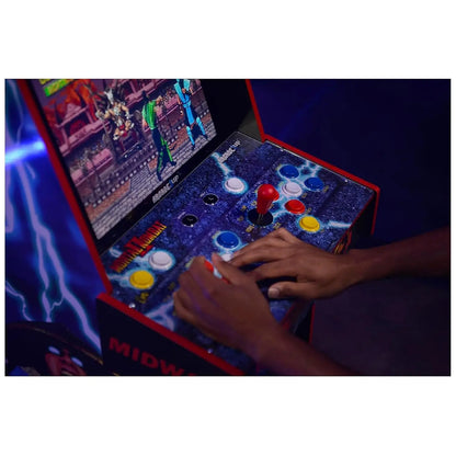 Mortal Kombat II arcade machine with blue lightning graphics, red joystick, and colorful buttons in use.