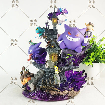 A colorful Gengar evolution diorama figure featuring multiple purple ghost characters and a haunted house.