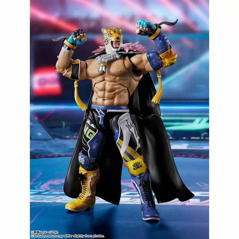 Tekken 8 King action figure with a jaguar mask, muscular build, cape, blue and yellow wrestling gear, and boots.