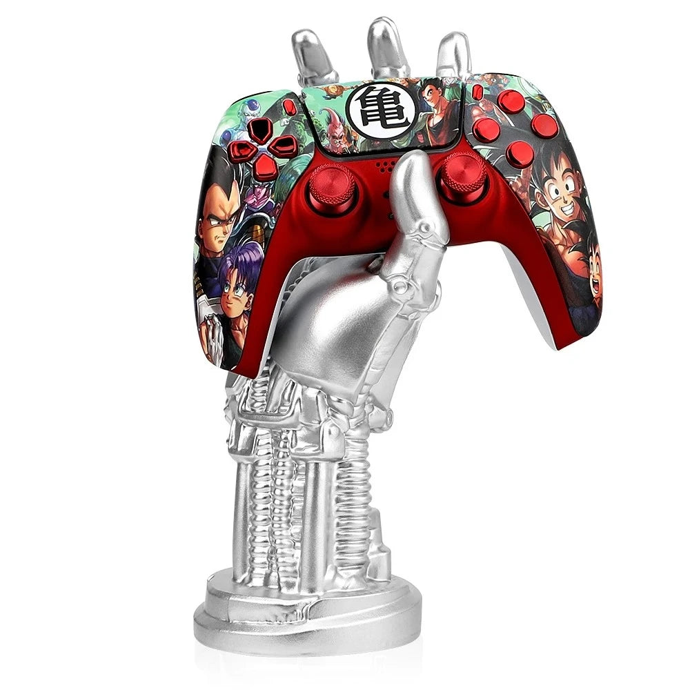 A silver robotic hand on a base holding a red anime-themed game controller.