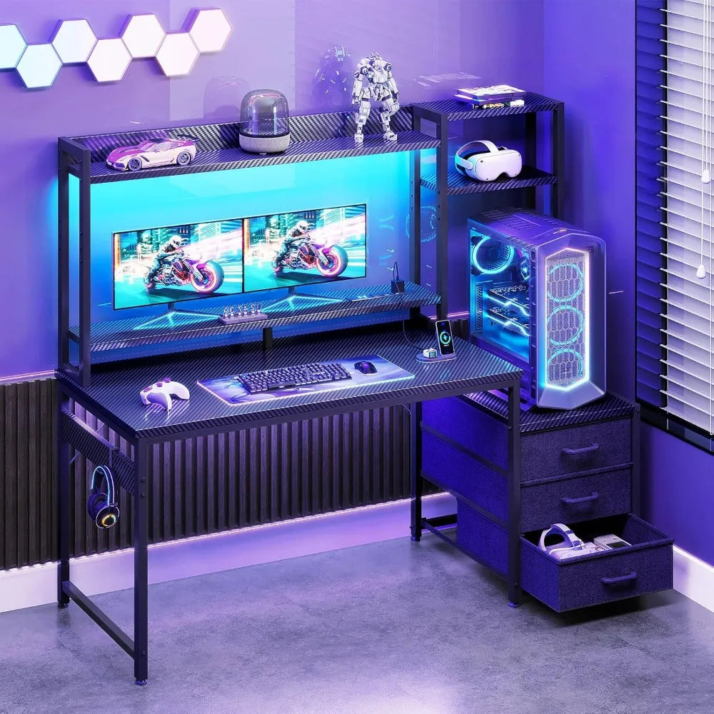 Black gaming desk with hutch, shelves, drawers, and glowing LED lights in purple room.