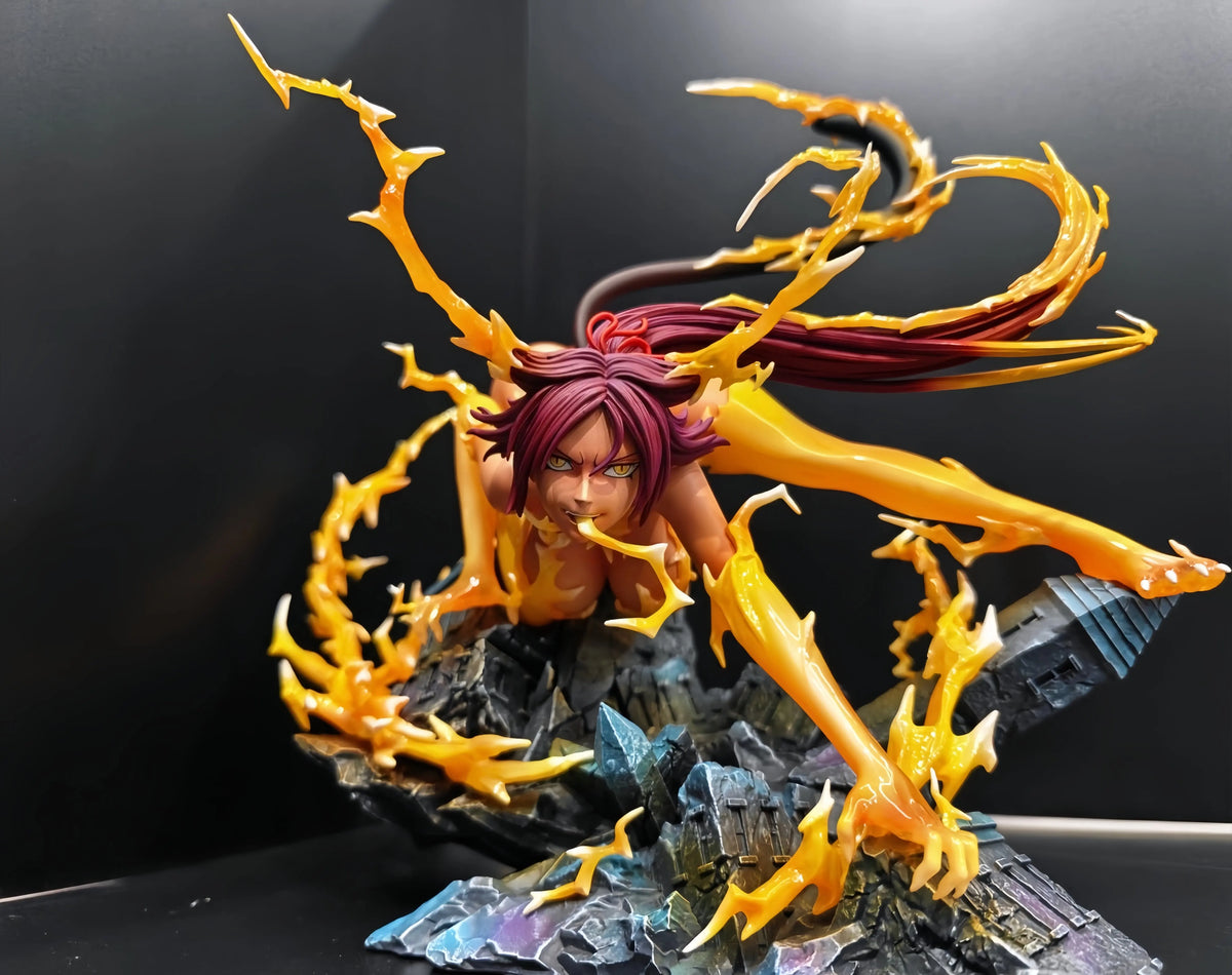 Yoruichi Shihouin anime figure crouches on rubble, surrounded by jagged yellow lightning effects.