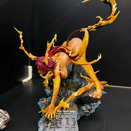 Yoruichi Shihouin anime figure in a cat-like stance on a rocky base, surrounded by yellow energy effects.