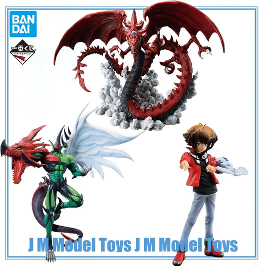 Yu-Gi-Oh! GX figures of Yuki Jyudai, a green and red monster with white wings, and a large red dragon on gray smoke.