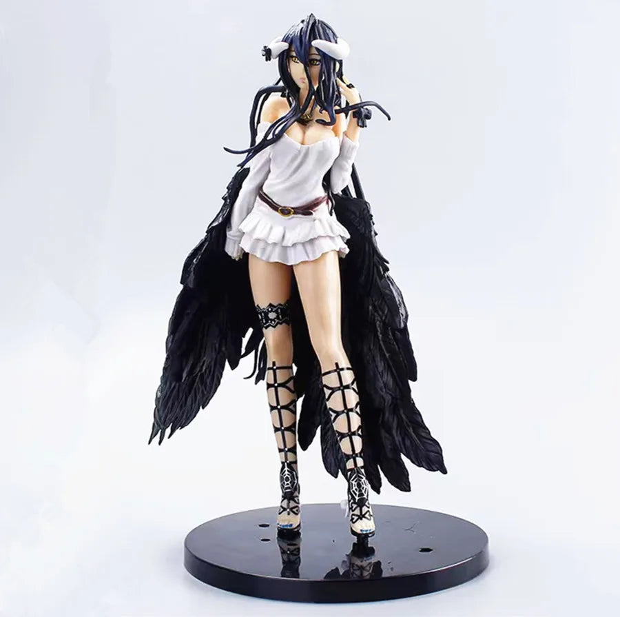 An Albedo action figure in a white dress, black feathered wings, horns, and gladiator sandals on a round black base.