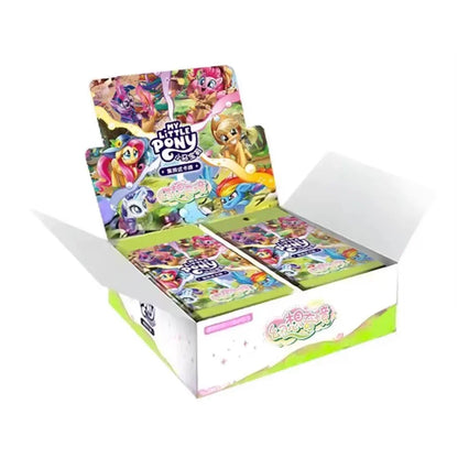 Open box of Kayou My Little Pony trading cards showing colorful foil packs and character artwork.