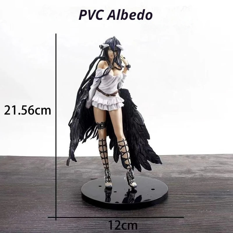 Albedo PVC figure in white top, black feathered wings, and tall laced boots on a black stand.
