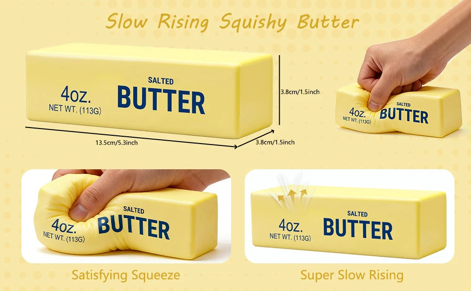 Yellow butter-shaped stress toy labeled "SALTED BUTTER 4oz" being squeezed by a hand, showing slow-rising squish.