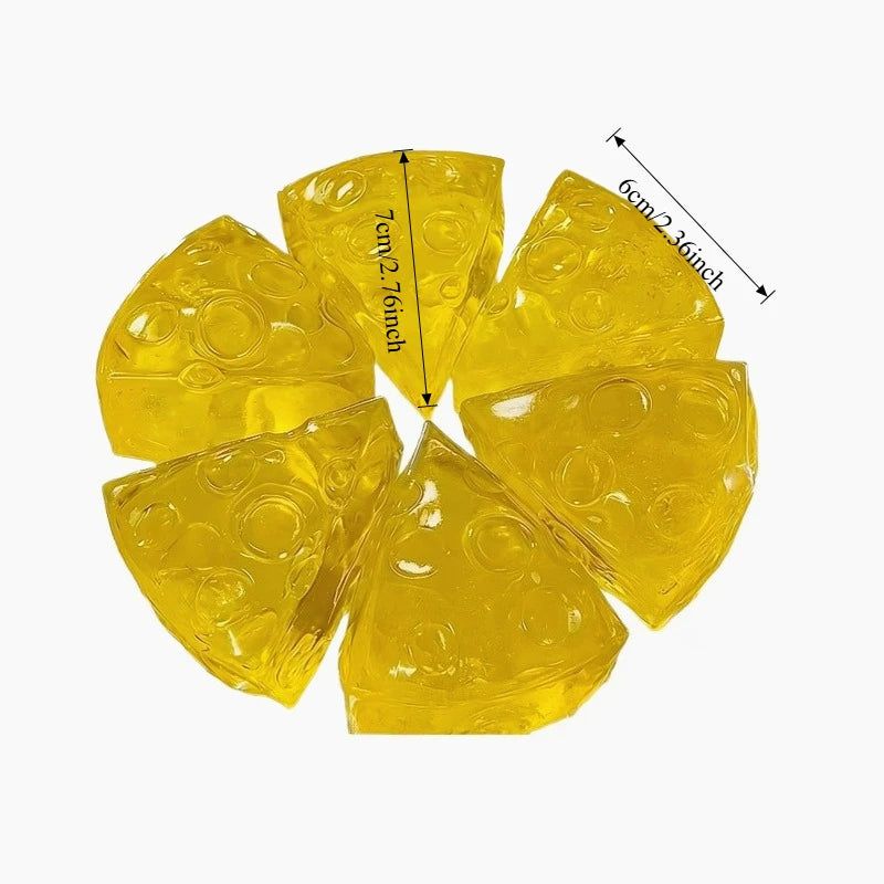 Six yellow, translucent cheese-wedge squishy toys with rounded holes and dimension arrows.