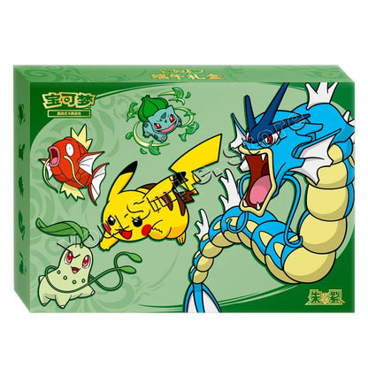 Green Pokémon trading card box featuring Pikachu, Gyarados, Magikarp, Bulbasaur, and Chikorita illustrations.