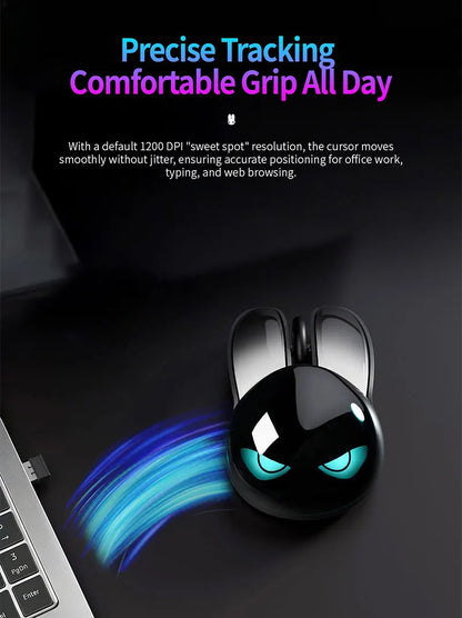 Black rabbit-shaped wireless mouse with glowing cyan angry eyes, long button ears, and a blue light trail.