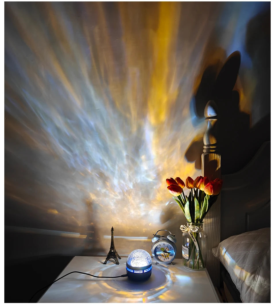 A round galaxy projector on a nightstand casts swirling yellow, white, and blue light across the wall.