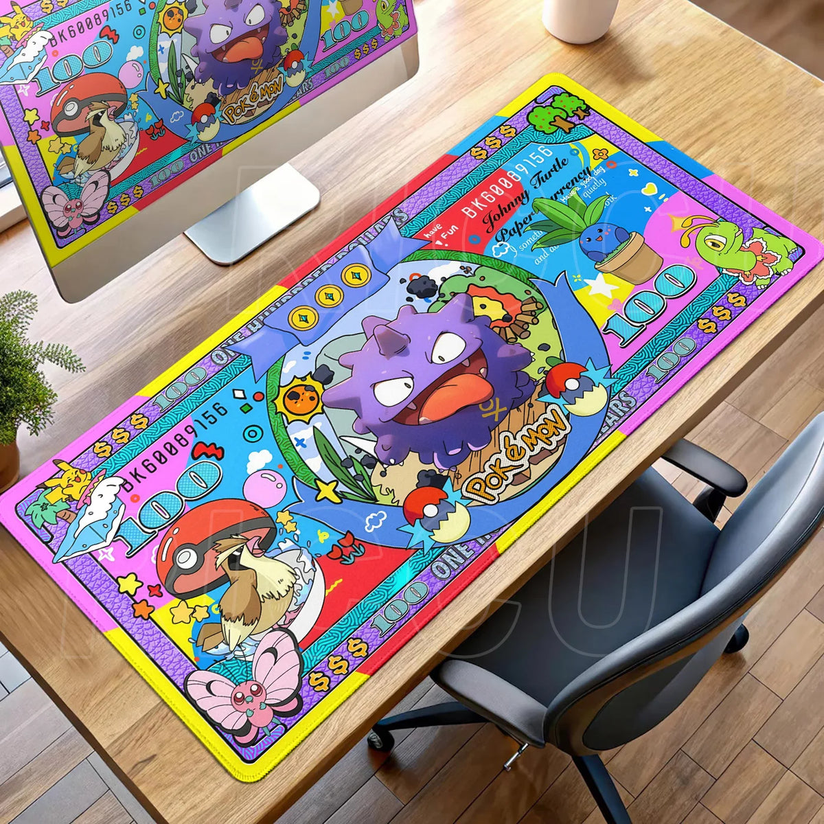 Colorful Pokémon desk mat featuring Gengar, Pidgey, and Oddish designed like a banknote on a wooden desk.