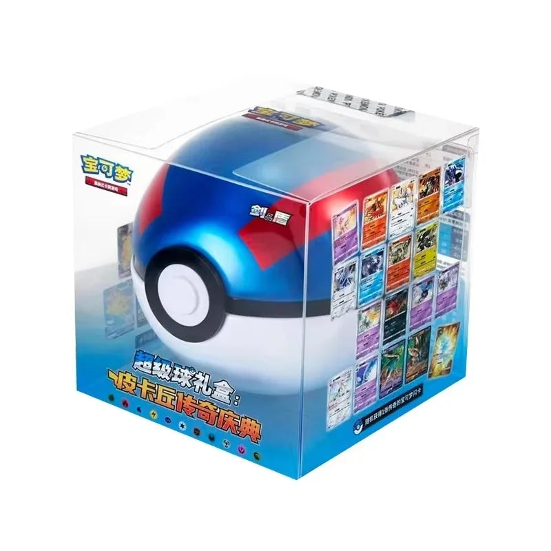 A blue and white Poké Ball tin inside a clear plastic gift box displaying trading cards.