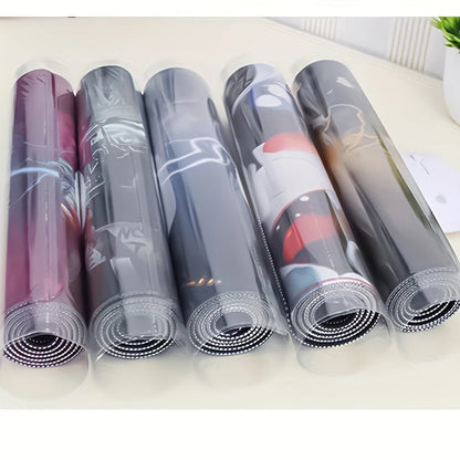 Five rolled desk mats in clear plastic packaging, showing various colorful designs, set on a surface.