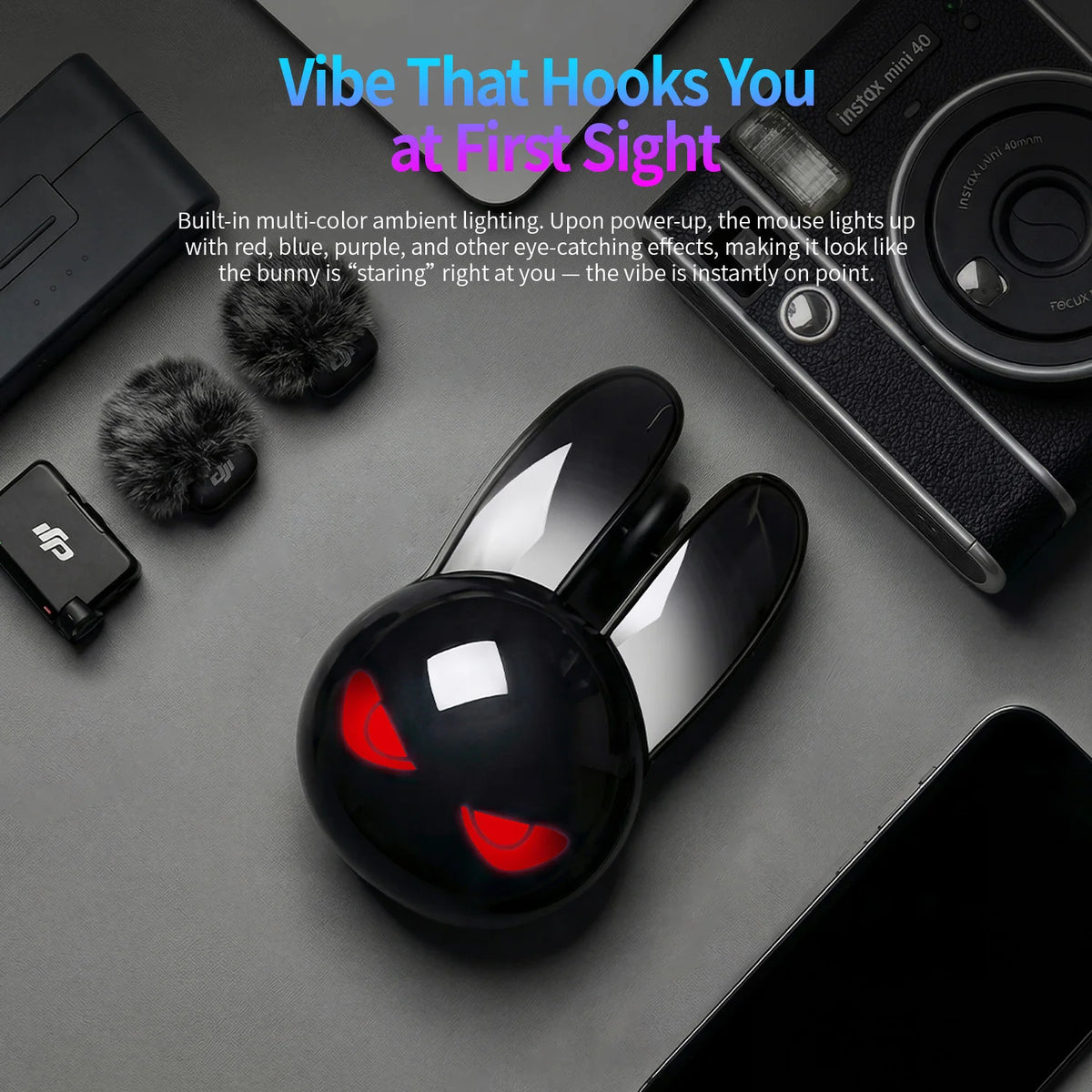 Black MOFii M6C Evil Rabbit mouse shaped like a bunny with glowing red eyes, surrounded by gadgets.