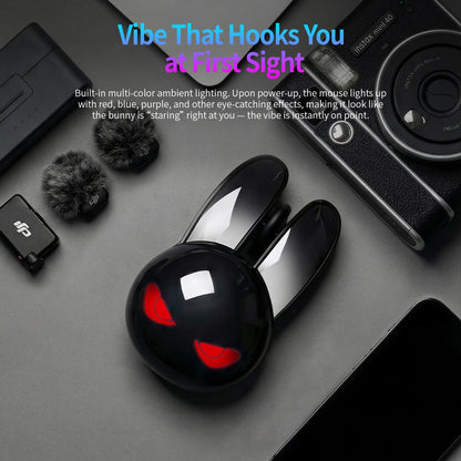 Black MOFii M6C Evil Rabbit mouse shaped like a bunny with glowing red eyes, surrounded by gadgets.
