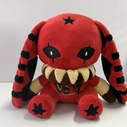 Red and black plush rabbit toy with long striped ears, black star on the forehead, pointed teeth collar, and black star paws.
