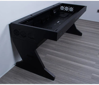 Large black computer chassis desk with open top, Z-shaped legs, and built-in ventilation fans.