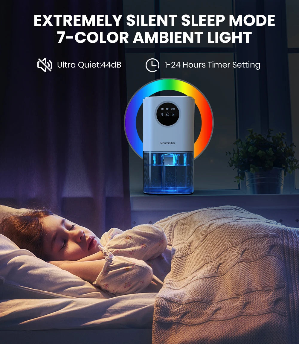 White portable dehumidifier with blue water tank and colorful light ring on a windowsill near a sleeping child.
