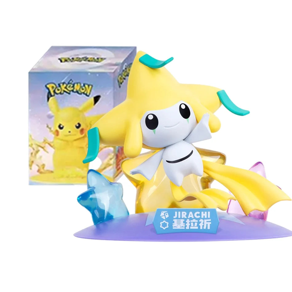Jirachi action figure with a yellow star-shaped head, teal tags, floating above a purple base with a matching box.