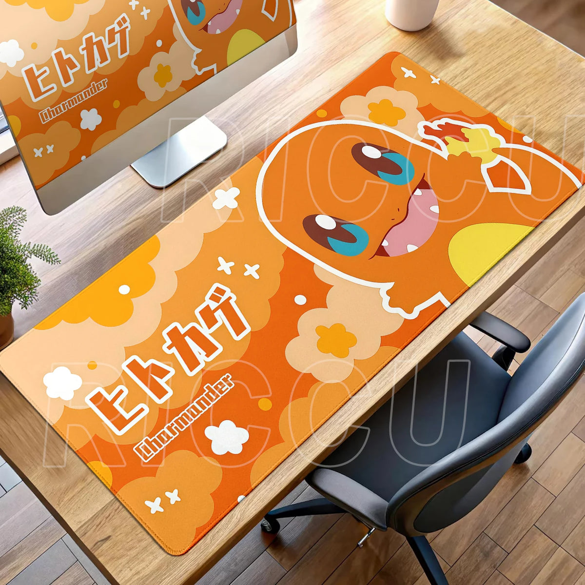 An orange Charmander desk mat with clouds, Japanese text, and the name Charmander.