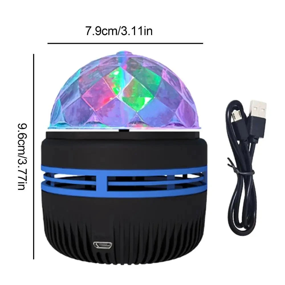 Black lamp with faceted purple-green dome, blue ring, dimensions 7.9x9.6cm, and USB cable.