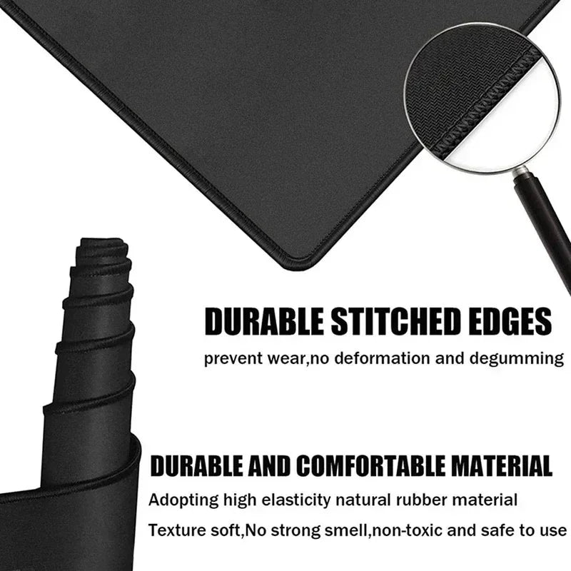 Black gaming mouse pad with stitched edges, shown rolled and flat with a magnified texture view.