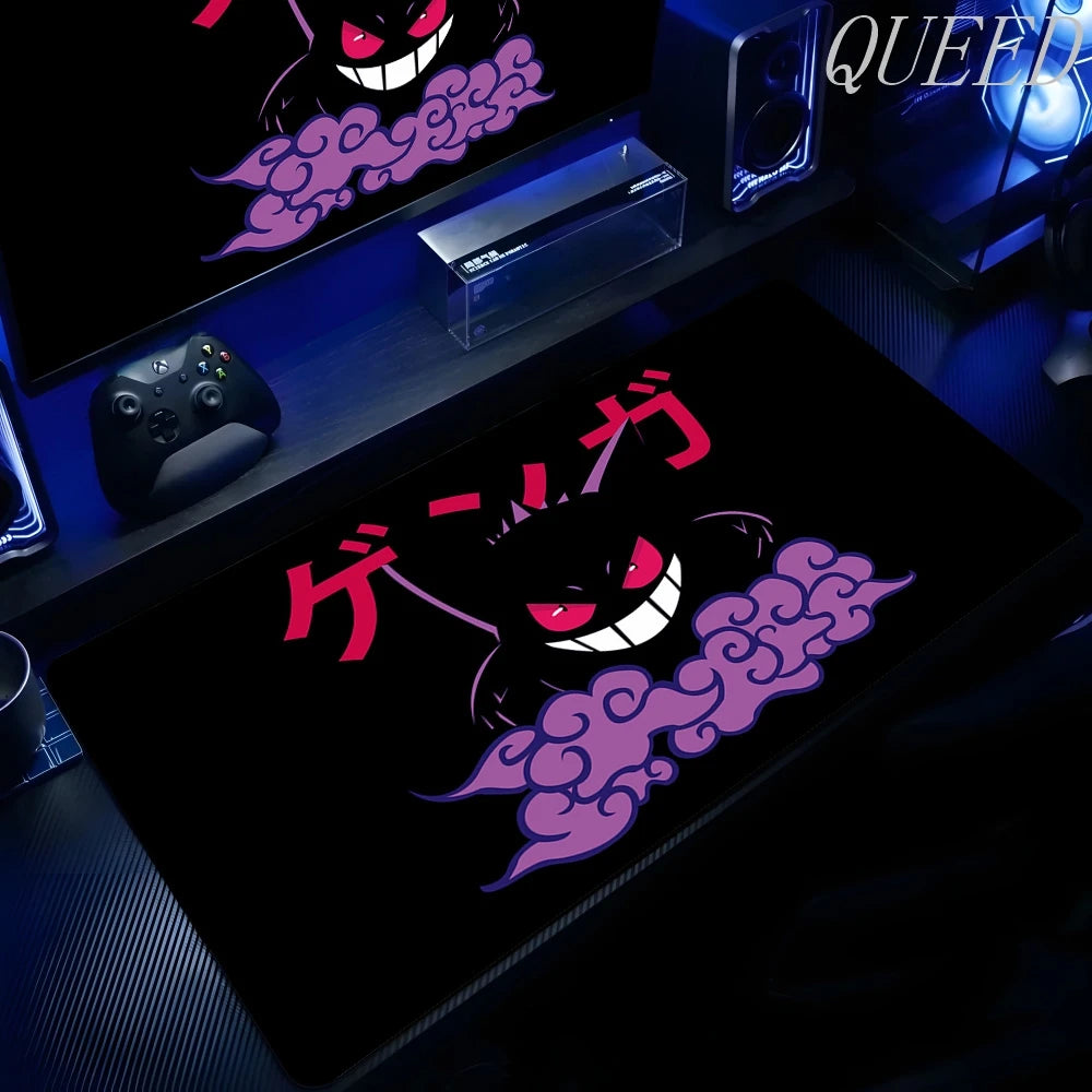 XXL black gaming mouse pad featuring Gengar with red eyes, a wide white smile, purple smoke, and Japanese text.