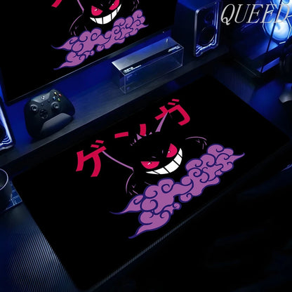 XXL black gaming mouse pad featuring Gengar with red eyes, a wide white smile, purple smoke, and Japanese text.