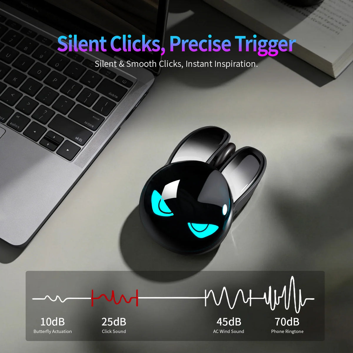 Black M6C Evil Rabbit mouse on desk, shaped like a rabbit with glowing cyan angry eyes and long ears.